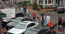 SuperGirl and others in front of the Occoquan Inn and Quinn's Goldsmith