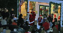 Close-up of Santa awarding a winner