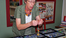 Glass Artist Mimi Vellek displaying some of her work during the Artwalk